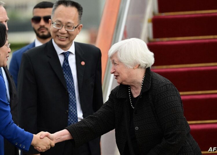 US Treasury Secretary Janet Yellen (R) arrives at Beijing Capital International Airport in Beijing on July 6, 2023. Yellen arrived in Beijing on July 6 kicking off a visit aimed at improving communication and stabilising the tense relationship between the world's two largest economies. (Photo by Pedro PARDO / POOL / AFP)