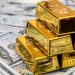 الصعود القياسي للذهب يتوقف مع ارتفاع الدولار وتوقعات الفائدة تدعمه